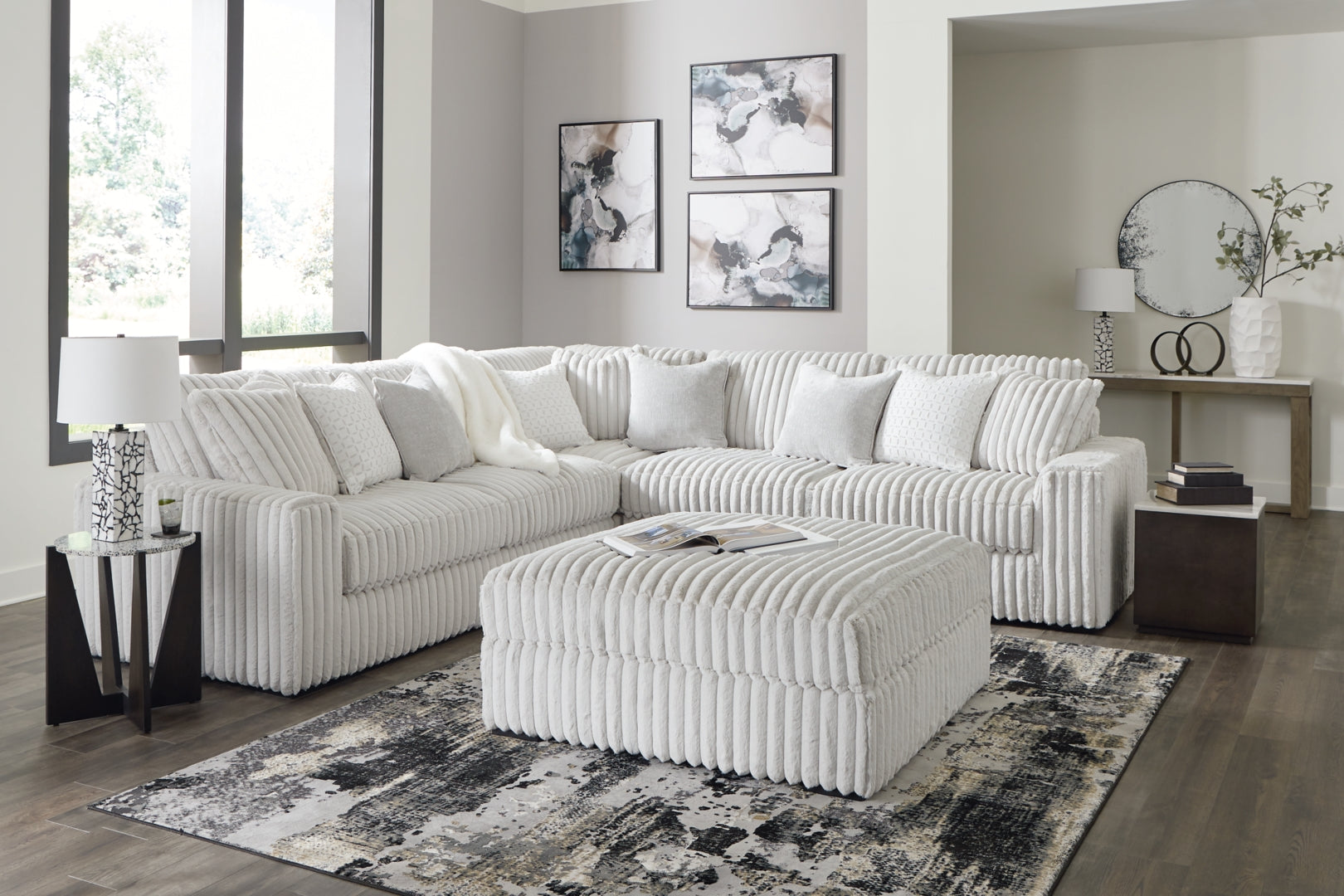 Stupendous 4-Piece Sectional with Ottoman